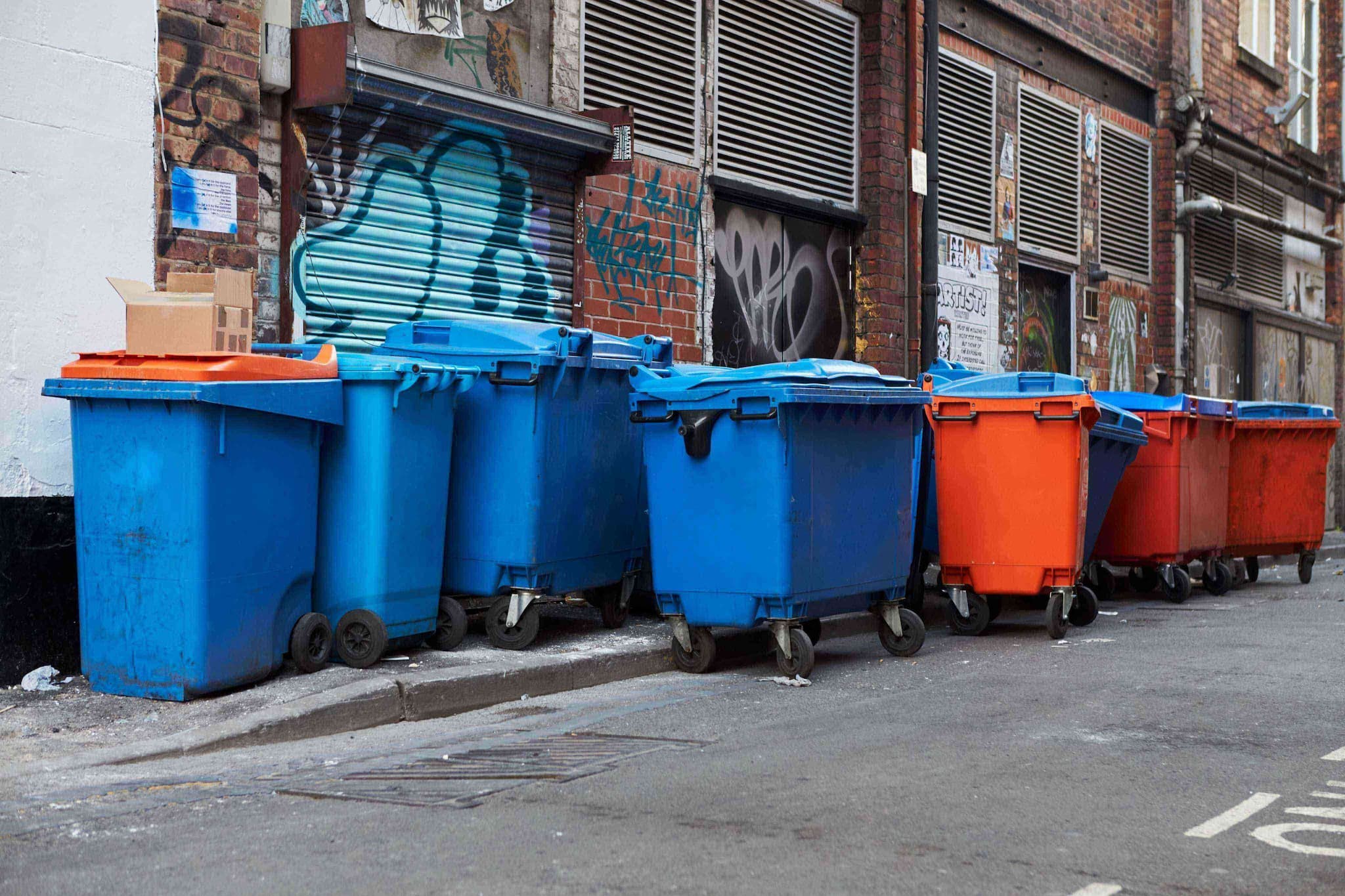 manchester-uk-10-may-2017-group-of-wheelie-bin_sDQTWKzib